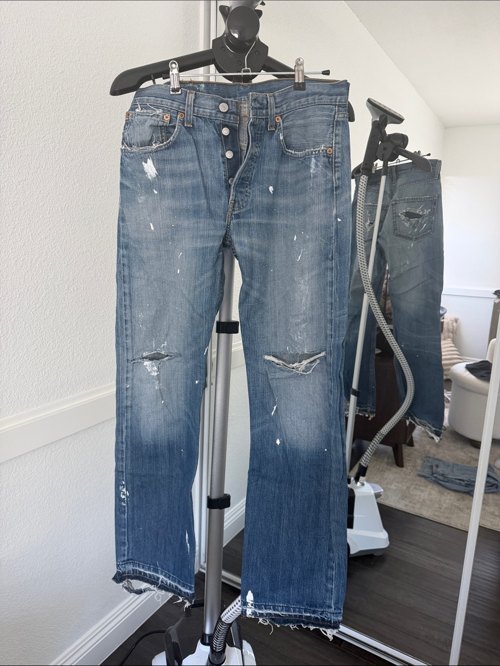 Boutique, one of a kind Distressed Blue Boot Cut Jeans